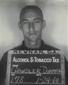 (HOOCH VERNACULAR) Binder containing striking pictures of moonshiners picked up throughout Georgia